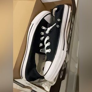 Brand new black converse slip on sneakers. NWT.